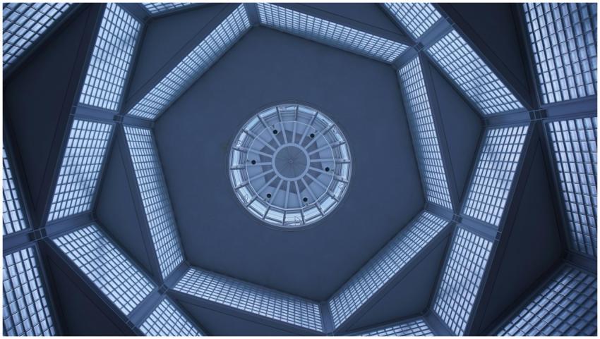 Futuristic glass ceiling architecture with geometr