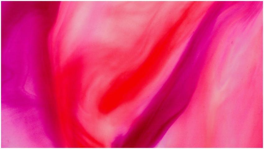 A vivid abstract pink swirl background ideal for c
