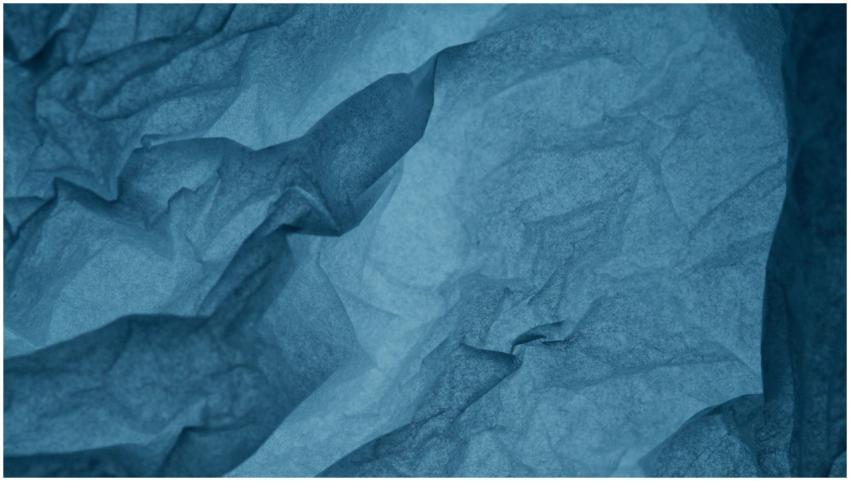 Abstract blue crumpled paper texture perfect for b
