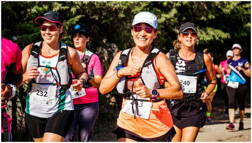 A group of smiling women participating in an outdo