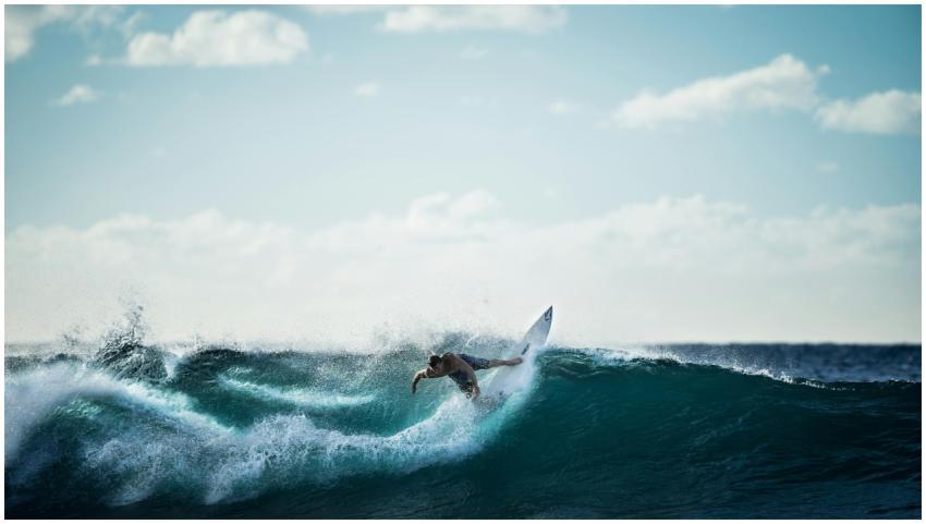 Thrilling action shot of a surfer riding the waves