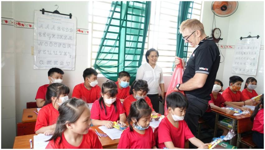 A vibrant classroom scene in Ho Chi Minh City with