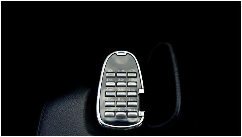 Close-up of luxury car interior featuring a classi