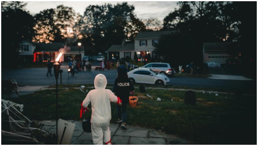 Children dressed in Halloween costumes trick-or-tr