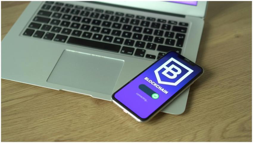 Smartphone displaying blockchain application resti