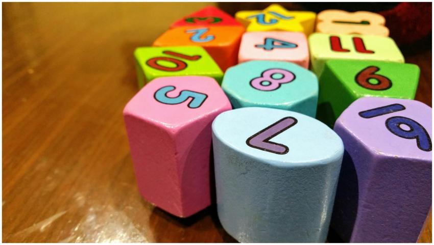 Close-up of colorful wooden blocks with numbers fo