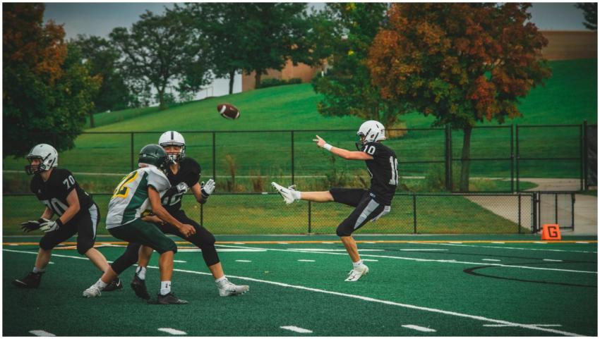 Exciting action of players in an American football