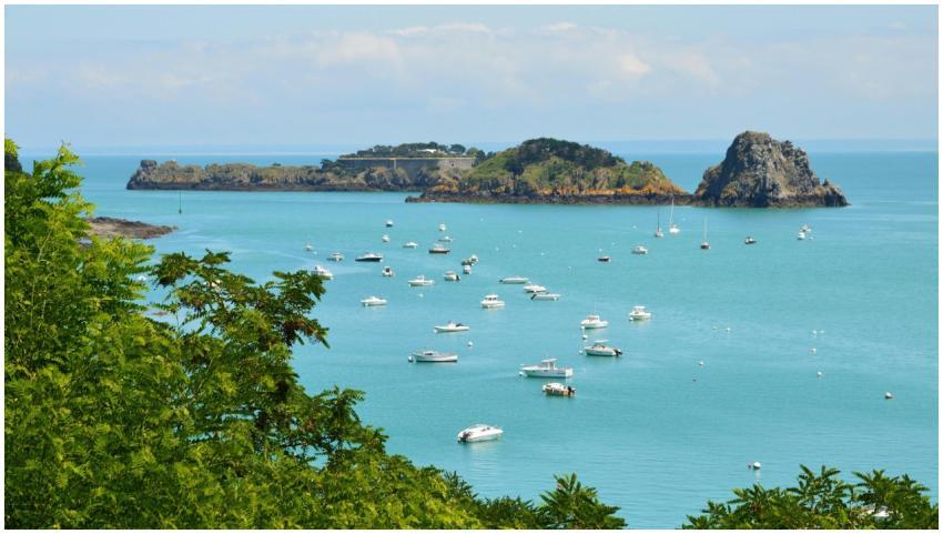 Beautiful view of boats in turquoise waters with i