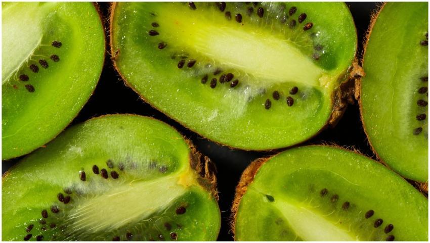 A detailed close-up of juicy kiwi slices showcasin