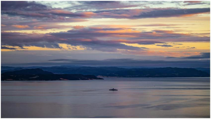 Serene sunset view over Trondheim Fjord, capturing