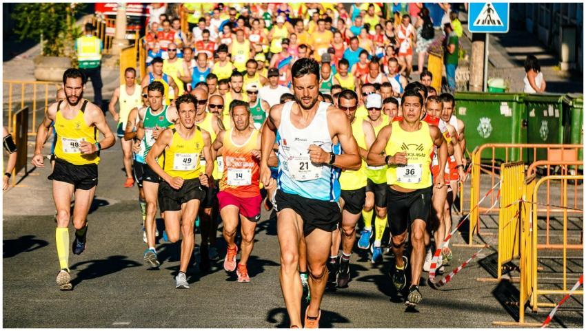 Intense marathon runners competing in a road race
