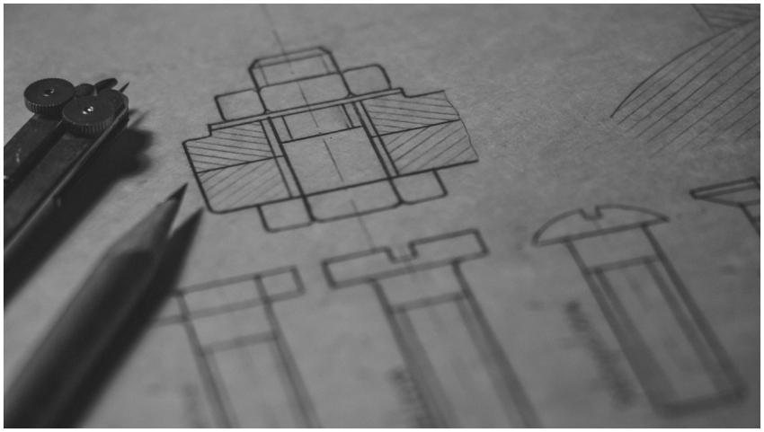 Detailed technical blueprint with pencil and compa