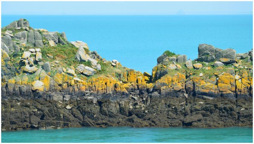 Vibrant rocky shoreline of Cancale, Bretagne with