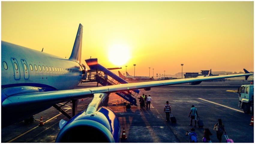 A vibrant image of passengers boarding an airplane