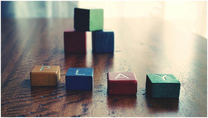 A vibrant still life of wooden alphabet blocks spe