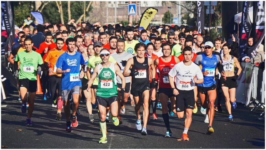 A large group of marathon runners competes outdoor