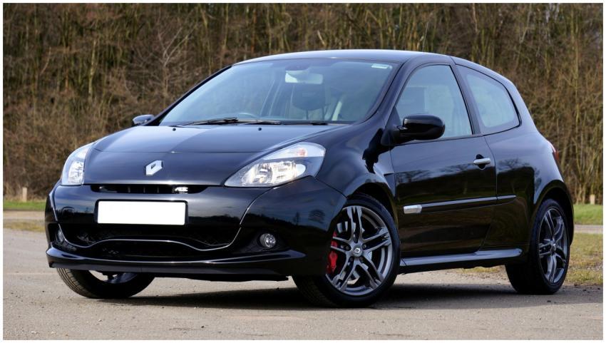 Stylish black Renault Clio RS parked outdoors with