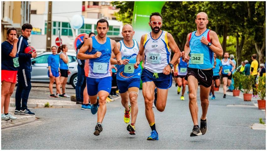 Vibrant scene of male marathon runners competing i
