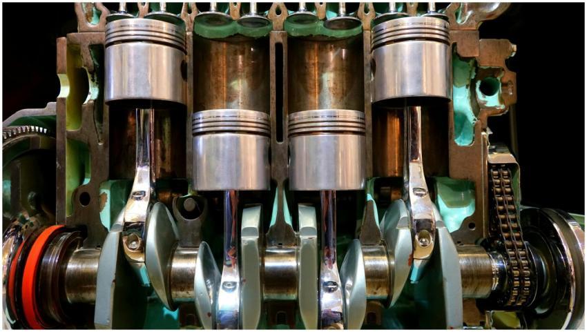 Close-up image of car engine pistons and crankshaf