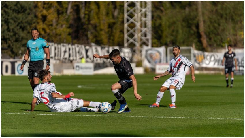 Dynamic action during a football match, capturing