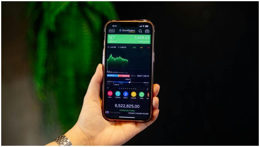 Close-up of a hand holding a smartphone displaying