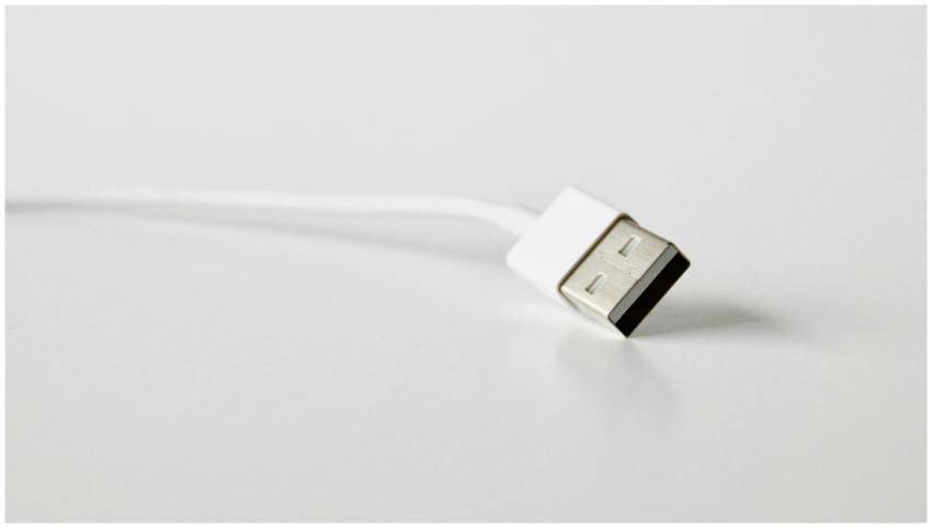 A detailed close-up image of a USB cable, perfect