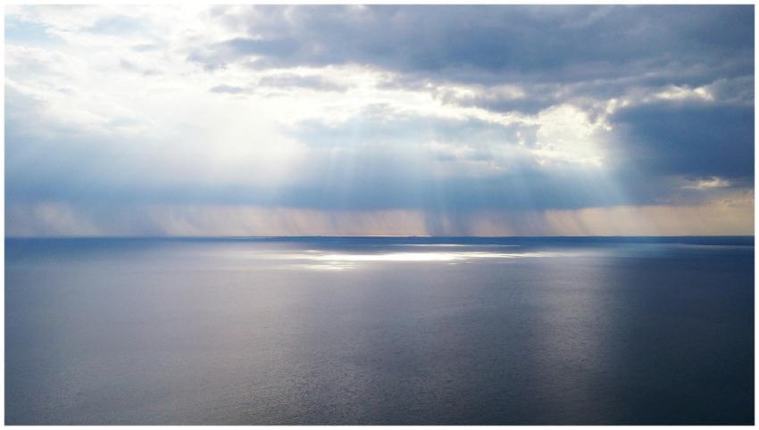 Captivating ocean view with sunrays breaking throu