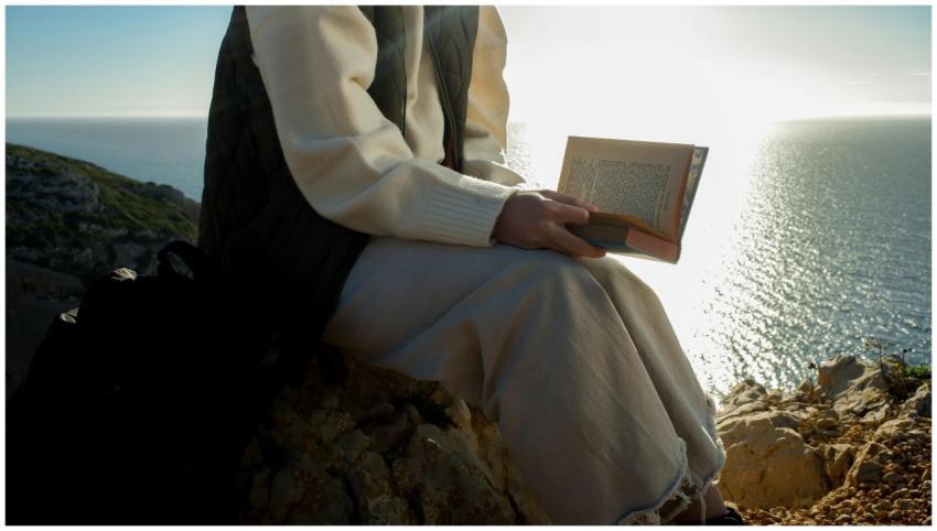 A serene moment captured as an individual reads by