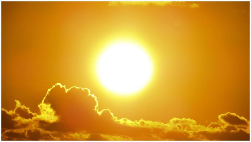 A stunning view of the golden sun shining through