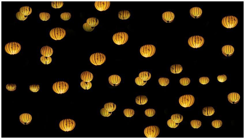 A beautiful display of glowing yellow lanterns set