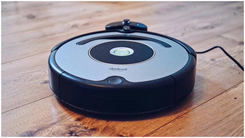 Close-up of a robotic vacuum cleaner operating on
