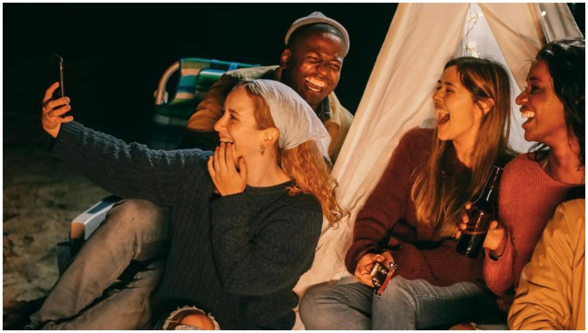 A joyful group of friends capturing memories at a