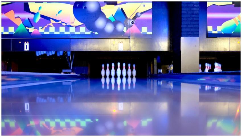 Colorful bowling alley with pins and reflections u