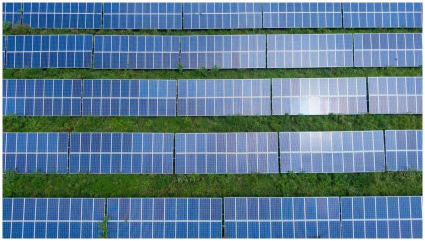 Aerial shot of a solar panel array generating rene