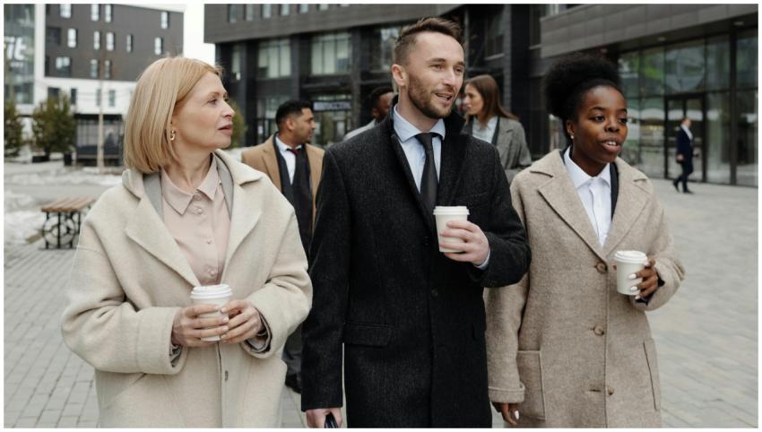 Business professionals discussing and enjoying cof