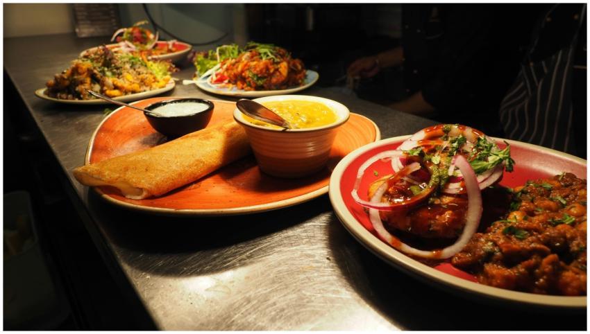 A tantalizing array of Indian dishes including dos