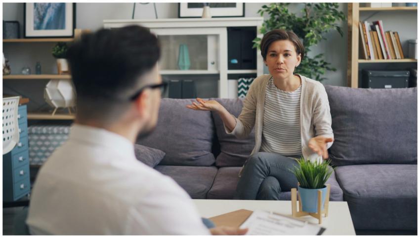 A woman consulting with a professional therapist i