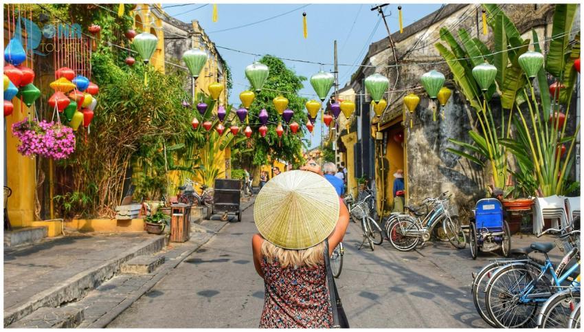 A vibrant street scene in Hội An with colorful lan