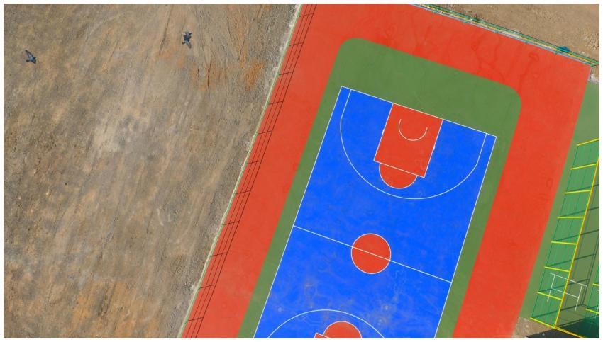 Explore a colorful sports court from above in Jamn