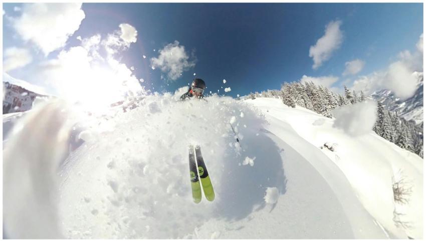 Exciting skiing action captured mid-air with snowy