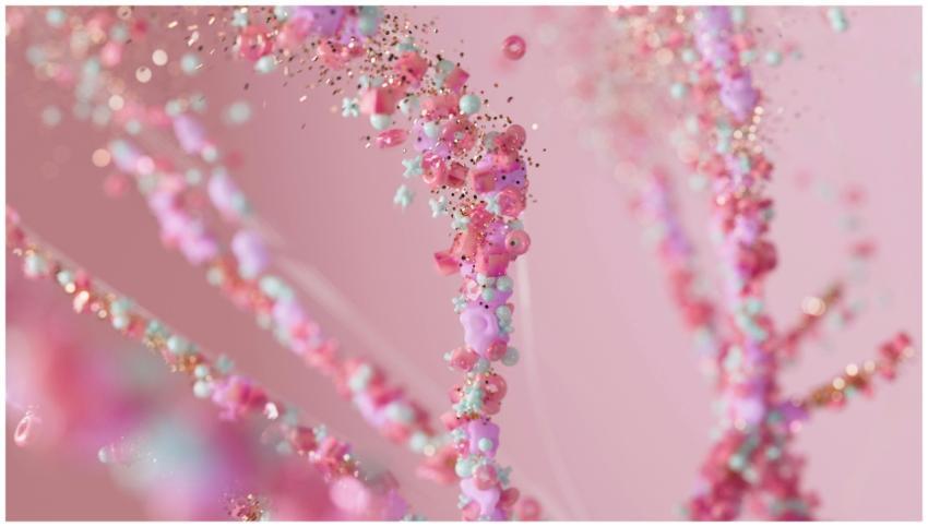 Close-up of pink and gold sparkling beads on a pas