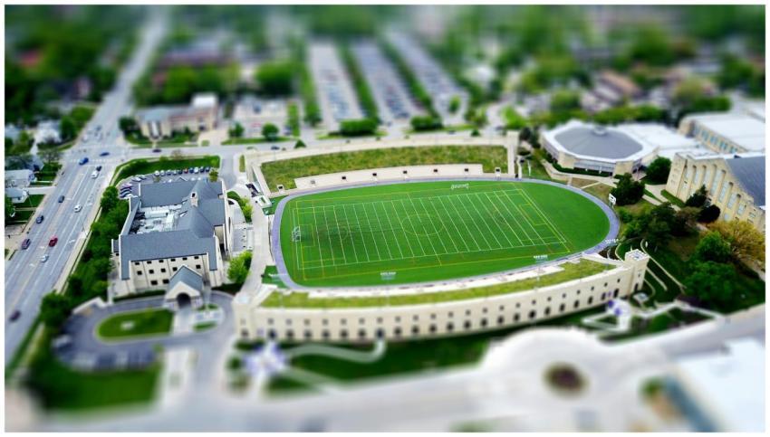 Drone shot of a soccer field and surroundings in M