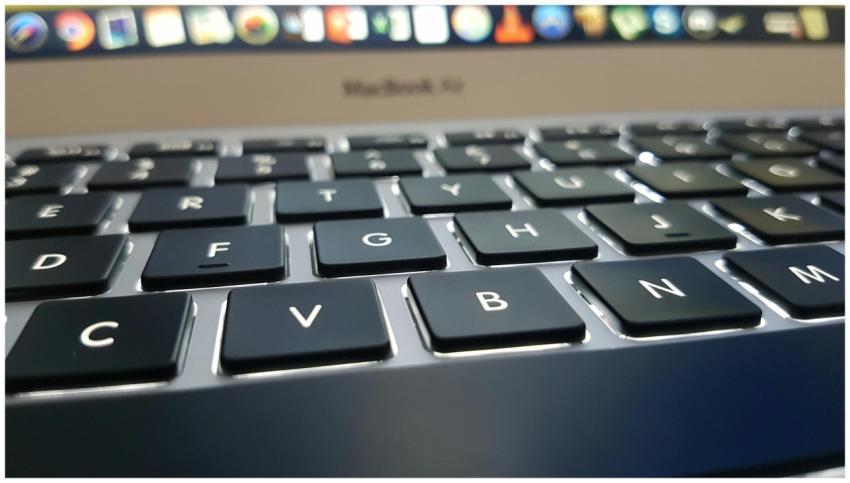 Detailed view of a MacBook Air keyboard with focus