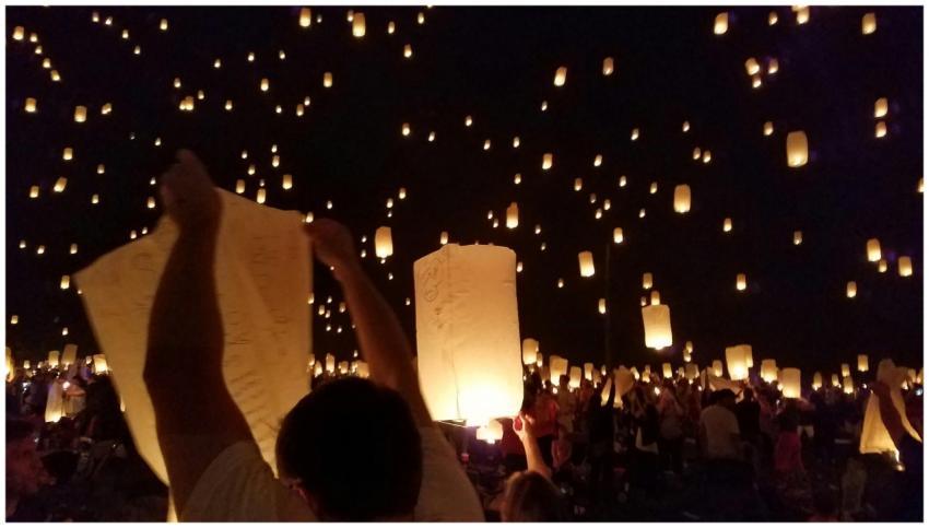 A vibrant night sky filled with glowing sky lanter