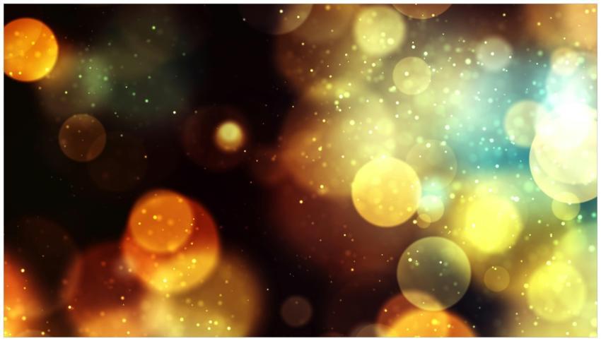 Vibrant bokeh background with golden and blue ligh