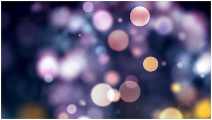 Vibrant abstract bokeh background with colorful li
