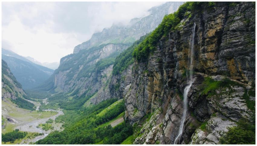 Breathtaking aerial view of the waterfall and dram