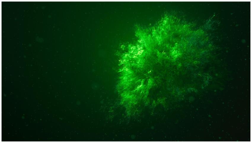 A vivid underwater green explosion creating a stun