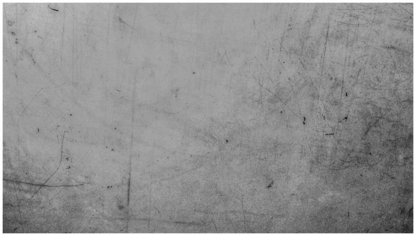 Detailed view of a textured grey surface with visi