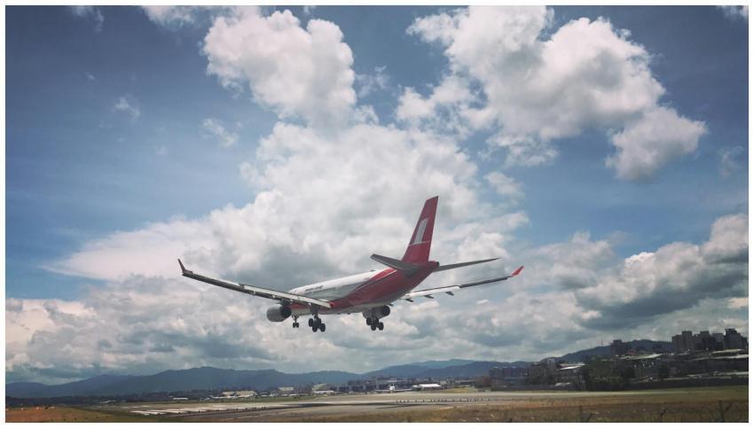 A commercial airplane approaches landing at Taipei